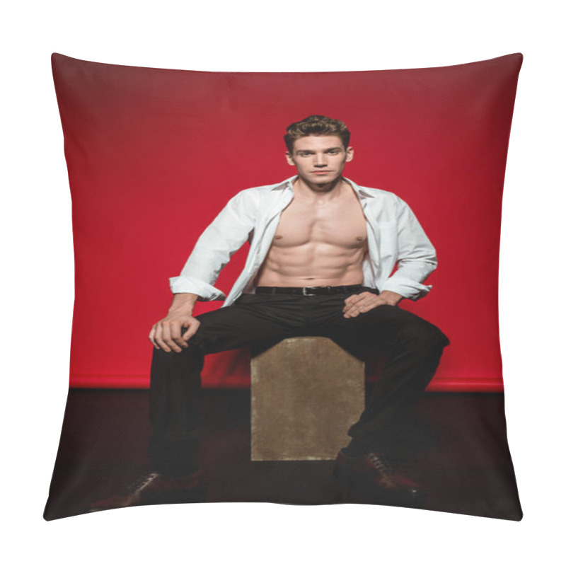 Personality  Sexy Young Elegant Man In Unbuttoned Shirt With Muscular Bare Torso Posing On Box On Red Background Pillow Covers