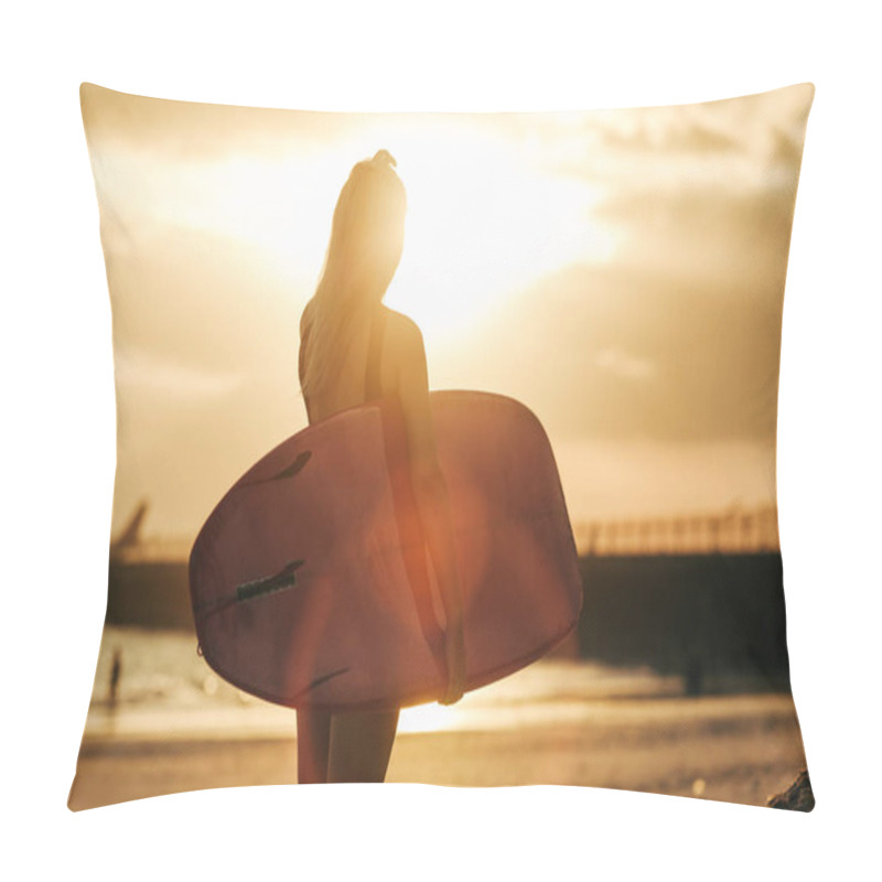 Personality  Rear View Of Surfer Posing With Surfboard On Beach At Sunset With Backlit Pillow Covers