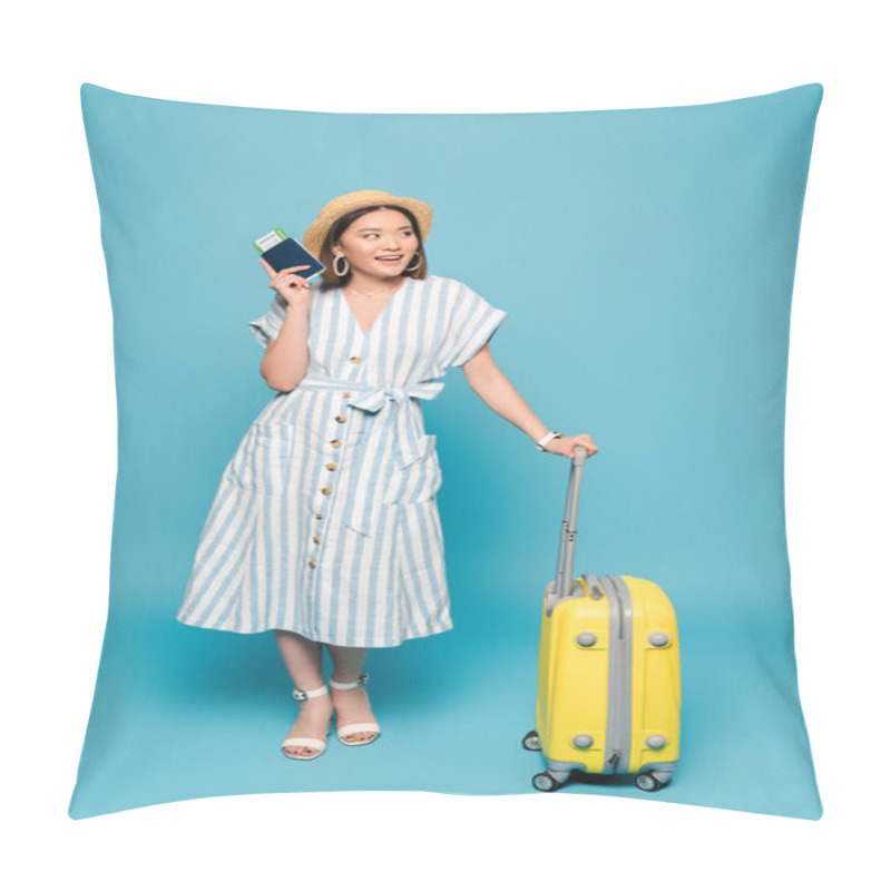 Personality  Smiling Brunette Asian Girl In Striped Dress And Straw Hat With Travel Bag And Passport With Air Ticket On Blue Background Pillow Covers