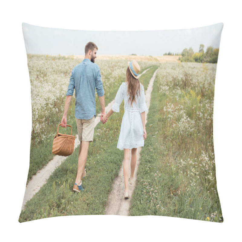 Personality  Rear View Of Couple With Picnic Basket Holding Hands While Walking In Field Pillow Covers