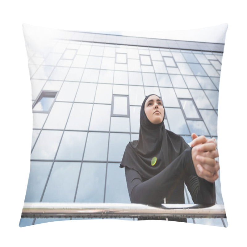 Personality  Low Angle View Of Muslim Woman In Hijab Standing With Clenched Hands Near Modern Building  Pillow Covers