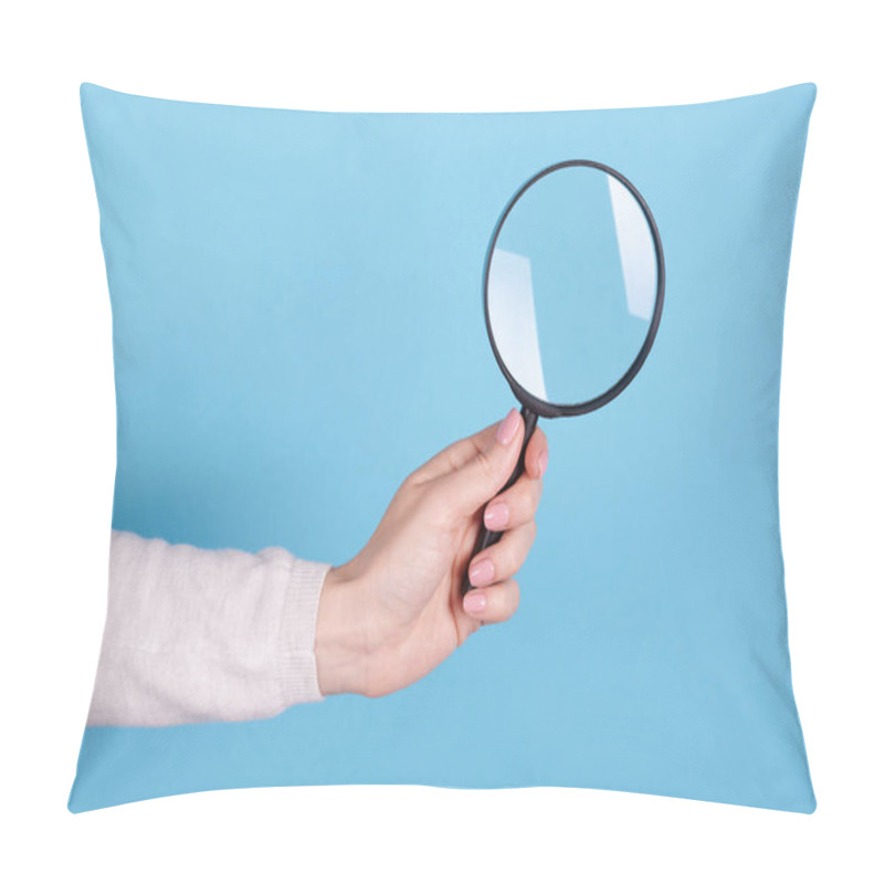 Personality  Magnifying Glass In Hand On A Blue Background. Pillow Covers