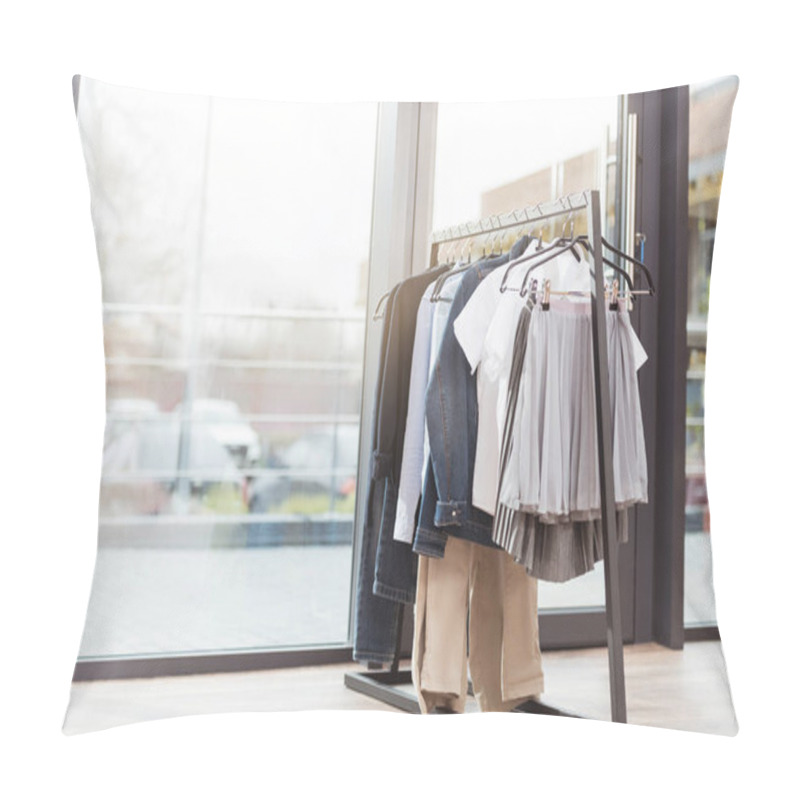 Personality  Various Clothes On Hager At Shop Interior Against Window  Pillow Covers