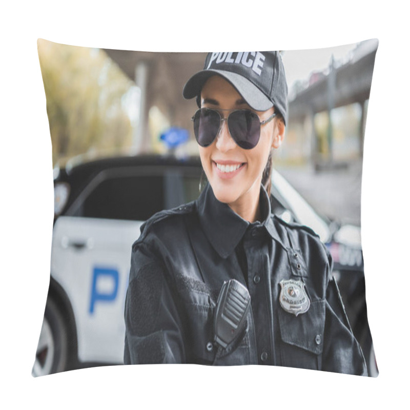 Personality  Happy Young Policewoman Looking At Camera With Blurred Patrol Car On Background Outdoors Pillow Covers