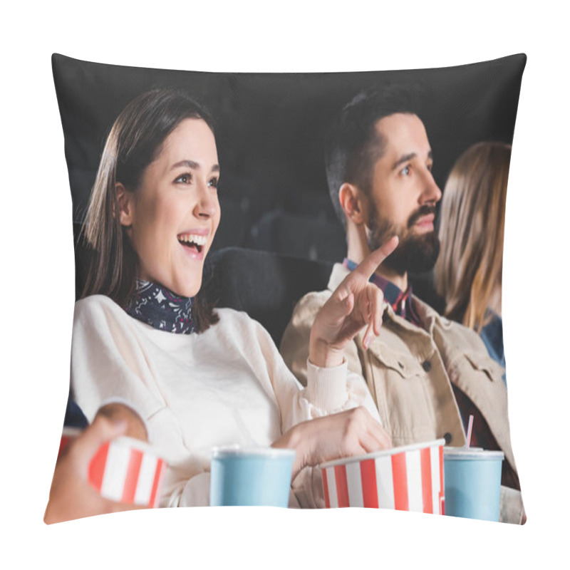 Personality  Selective Focus Of Smiling Woman Pointing With Finger And Watching Movie With Friends In Cinema  Pillow Covers