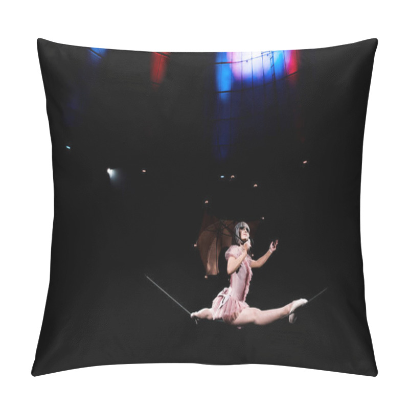 Personality  Low Angle View Of Aerial Acrobat In Costume Holding Umbrella And Doing Splits On Rope  Pillow Covers