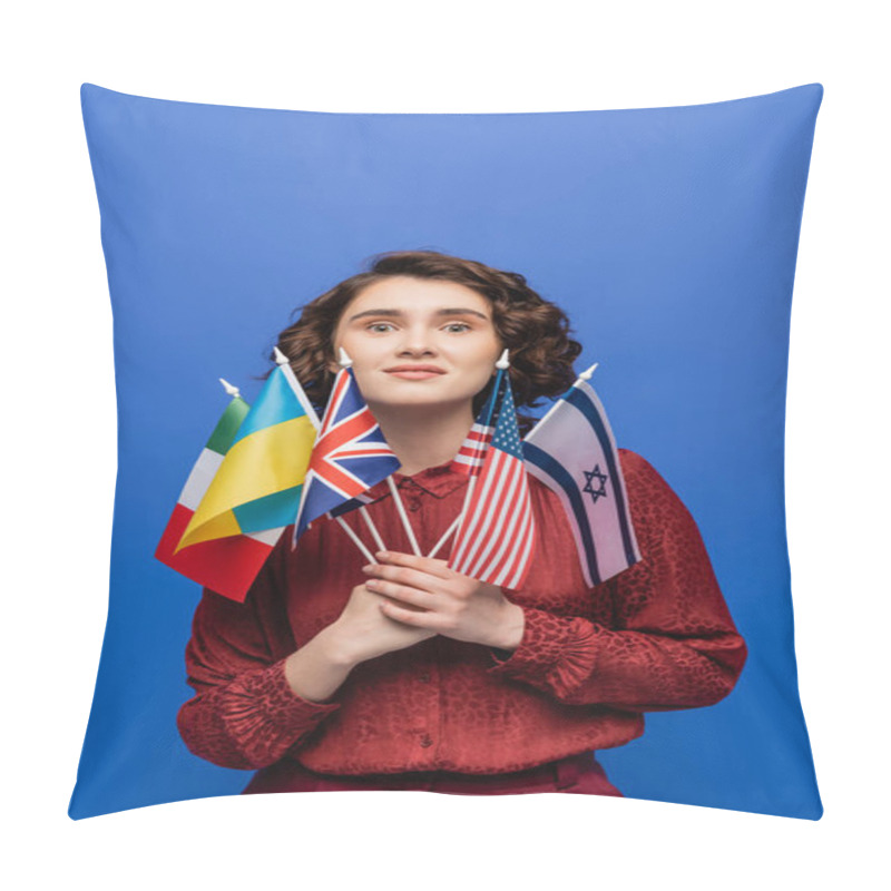 Personality  Amazed Woman Holding Flags Of Various Countries And Looking At Camera Isolated On Blue Pillow Covers