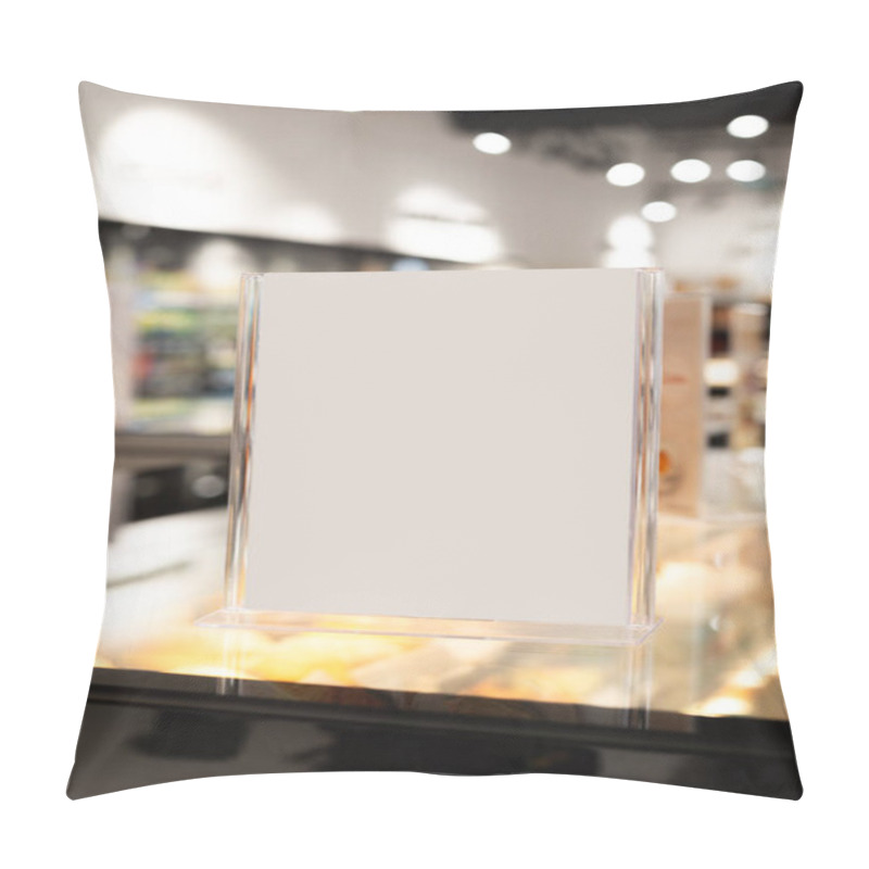 Personality  A Clean And Modern Acrylic Sign Holder Positioned On A Countertop, With A Blank Space Perfect For Adding Custom Text Or Graphics. The Blurred Background Highlights A Cafe Or Retail Environment With Warm Lighting And Contemporary Decor. Pillow Covers