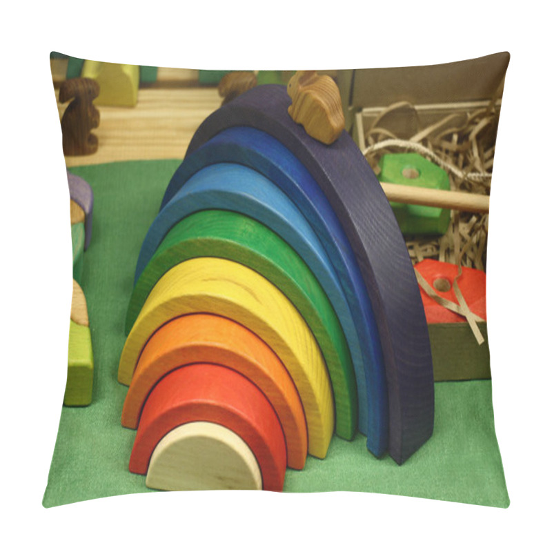 Personality  Various Wooden Toys Lie On A Table. In The Centre There Is A Cheerful Rainbow. Pillow Covers