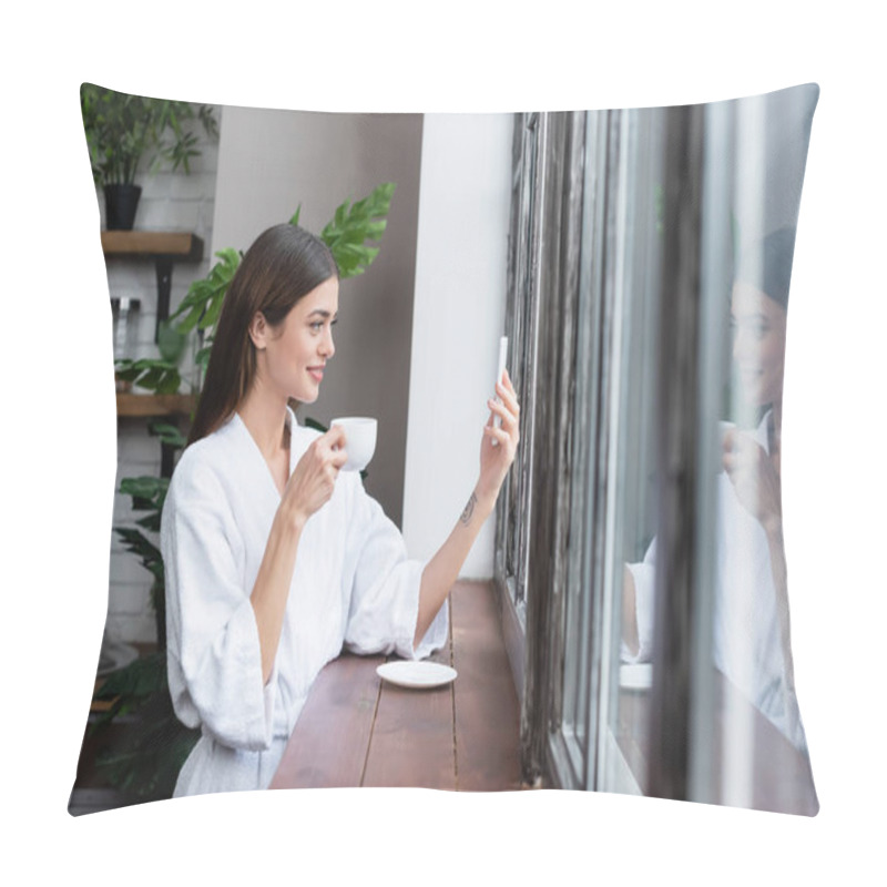 Personality  Pretty Young Adult Woman In Bathrobe Taking Selfie On Cellphone Near Window In Modern Loft  Pillow Covers