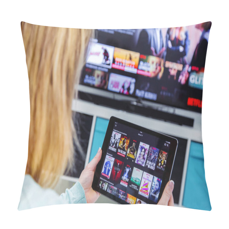 Personality  Woman Holding A Touch Pad And Switching Channels On France Netflix HomePage. With TV Set On Background. Pillow Covers