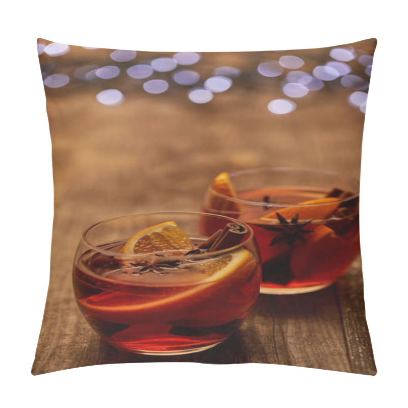 Personality  Close Up View Of Delicious Hot Mulled Wine In Glasses With Orange Pieces On Wooden Tabletop With Bokeh Lights On Backdrop Pillow Covers