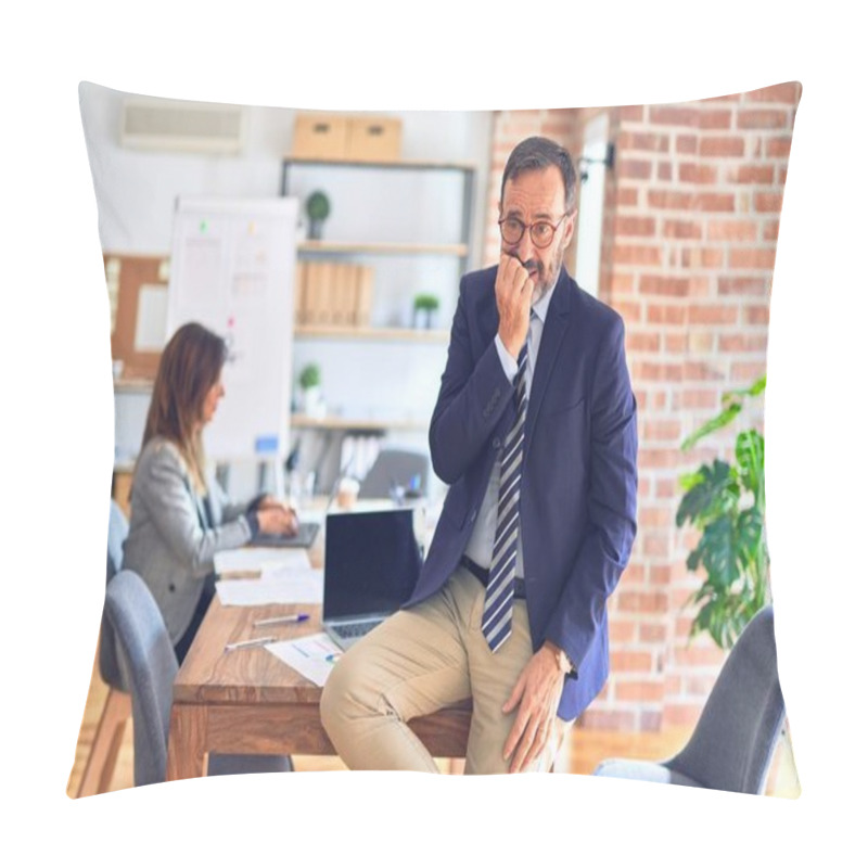 Personality  Middle Age Handsome Businessman Wearing Glasses Sitting On Desk At The Office Looking Stressed And Nervous With Hands On Mouth Biting Nails. Anxiety Problem. Pillow Covers