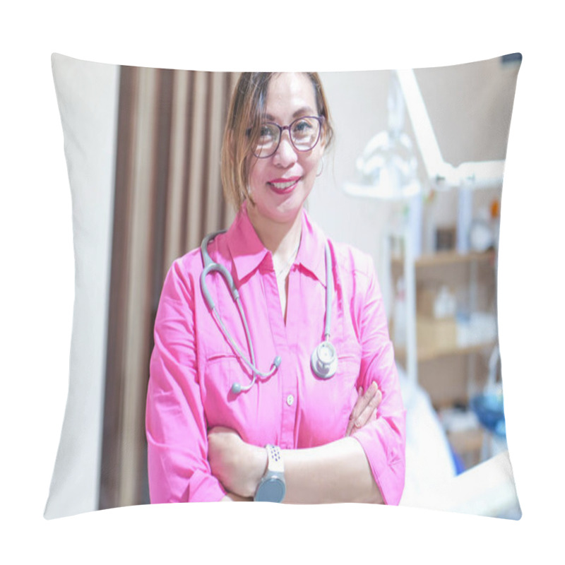 Personality  A Medical Professional In A Pink Shirt Holds A Stethoscope In A Clinic Setting, Ready For Patient Examination. The Background Includes Medical Equipment, Emphasizing A Healthcare Environment. Pillow Covers