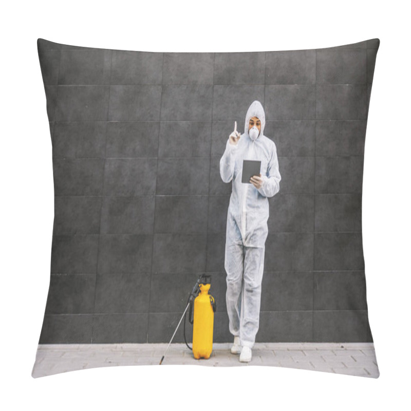 Personality  Man In Virus Protective Suit And Mask Looking And Typing On Tablet, Disinfecting Buildings Of Coronavirus With The Sprayer. Infection Prevention And Control Of Epidemic. World Pandemic. Pillow Covers