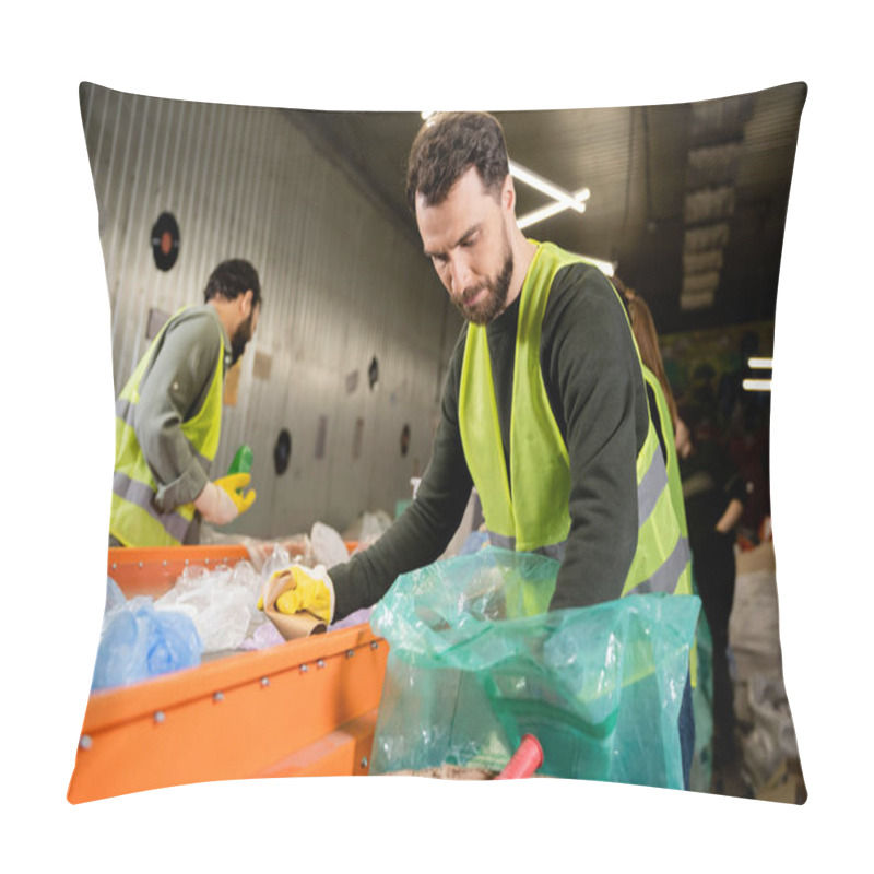 Personality  Bearded Sorter In High Visibility Vest And Protective Glove Separating Garbage Near Conveyor And Blurred Colleagues Working Together In Waste Disposal Station, Recycling Concept Pillow Covers