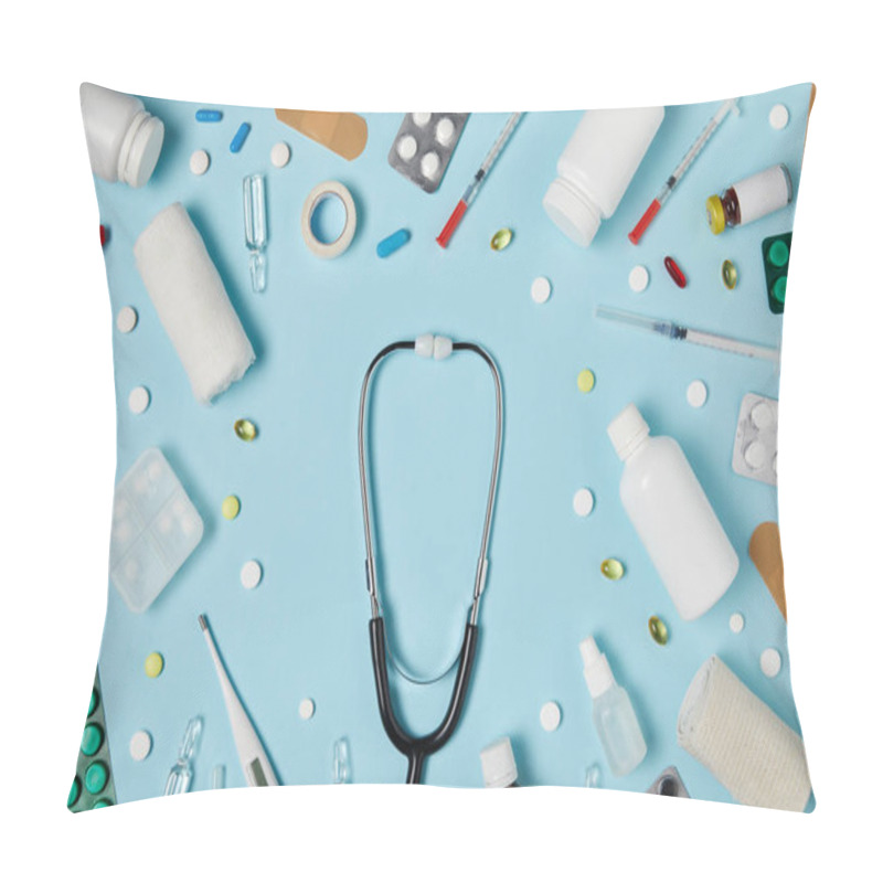 Personality  Top View Of Stethoscope Surrounded With Different Medicines On Blue Surface Pillow Covers