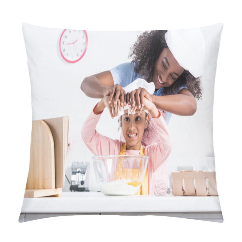 Personality  Smiling African American Mother And Daughter In Chef Hats Putting Eggs Into Bowl Together On Kitchen Pillow Covers