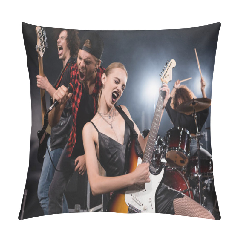 Personality  KYIV, UKRAINE - AUGUST 25, 2020: Blonde Woman Playing Electric Guitar While Shouting With Vocalist And Guitarist With Female Drummer On Blurred Background Pillow Covers