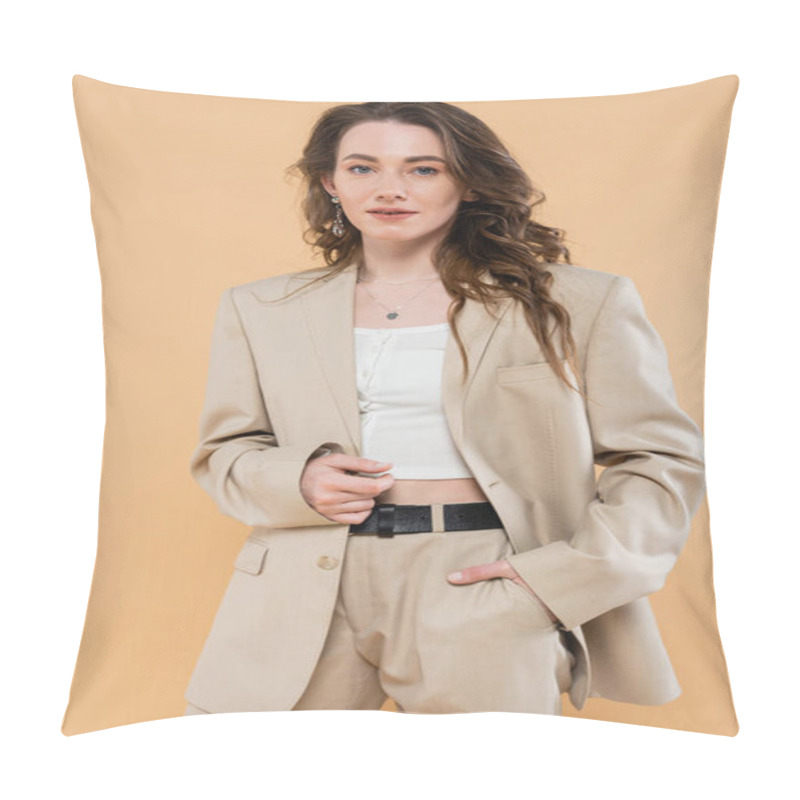 Personality  Fashion Trend Concept, Young Woman With Wavy Hair Standing In Fashionable Suit And Looking At Camera On Beige Background, Hand In Pocket, Classic Style, Stylish Posing  Pillow Covers