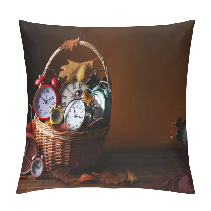 Personality  Alarm Clocks And Dry Leaves In Wicker Basket On Wooden Table Against Brown Background, Space For Text Pillow Covers