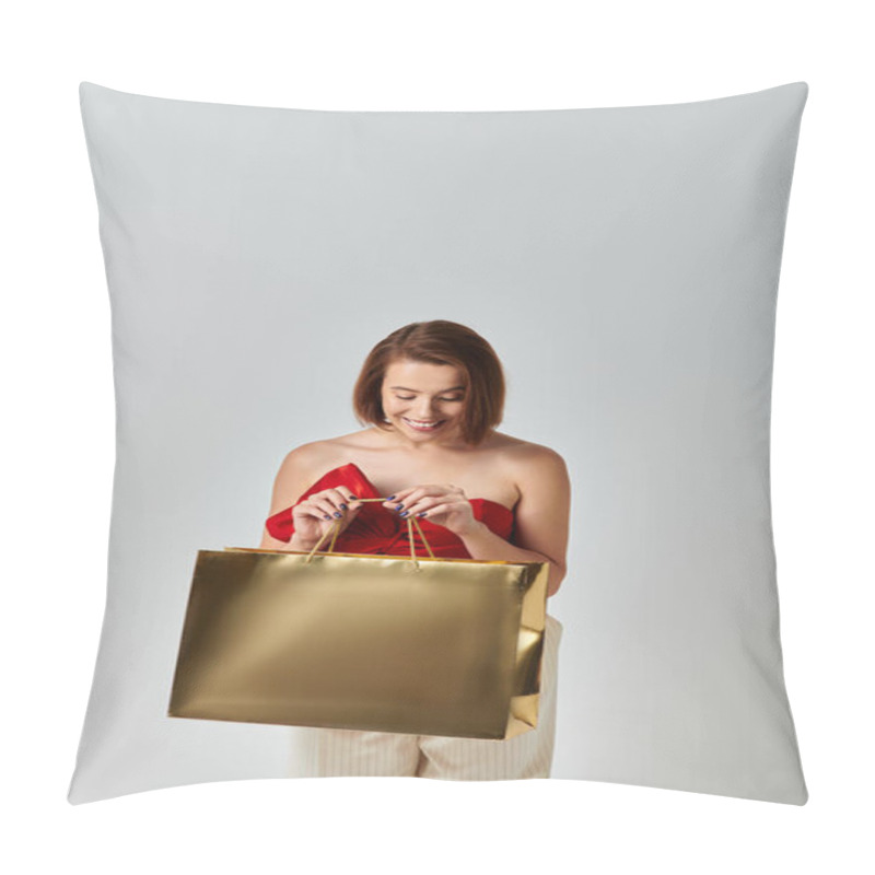 Personality  Christmas Shopping, Joyful Young Woman In Trendy Attire Looking Inside Of Shopping Bag On Grey Pillow Covers