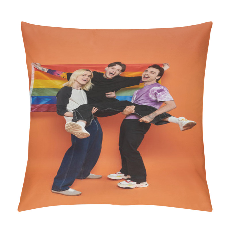 Personality  Three Young Friends In Vibrant Attire Pose With A Rainbow Pride Flag Against An Orange Background. Pillow Covers