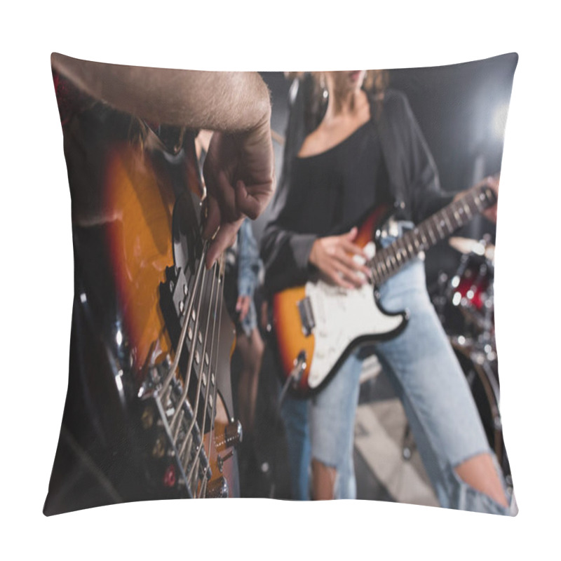 Personality  KYIV, UKRAINE - AUGUST 25, 2020: Cropped View Of Man Playing Bass Guitar Near Female Musician With Backlit On Blurred Background Pillow Covers