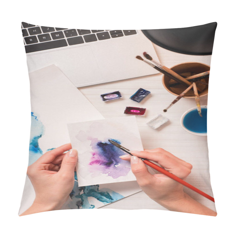 Personality  Cropped View Of Designer Working At Office Desk With Laptop And Designer Supplies Pillow Covers