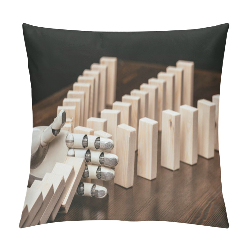 Personality  Robotic Hand Preventing Wooden Blocks From Falling On Desk Isolated On Black Pillow Covers