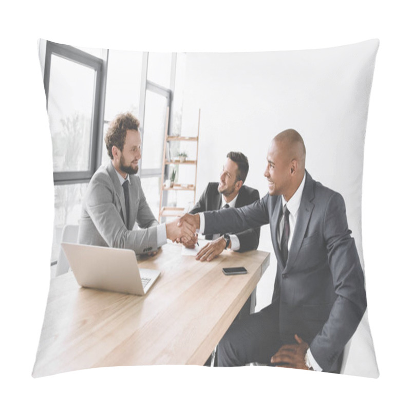 Personality  Multiethnic Smiling Businessmen Shaking Hands At Meeting At Workplace With Laptop Pillow Covers