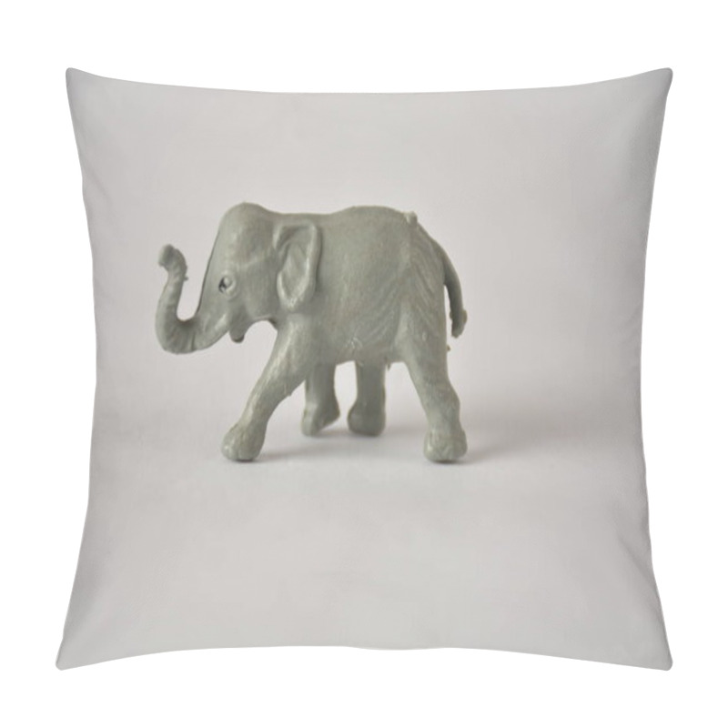 Personality  A Small, Detailed Gray Elephant Figurine Against A Simple White Background. Pillow Covers