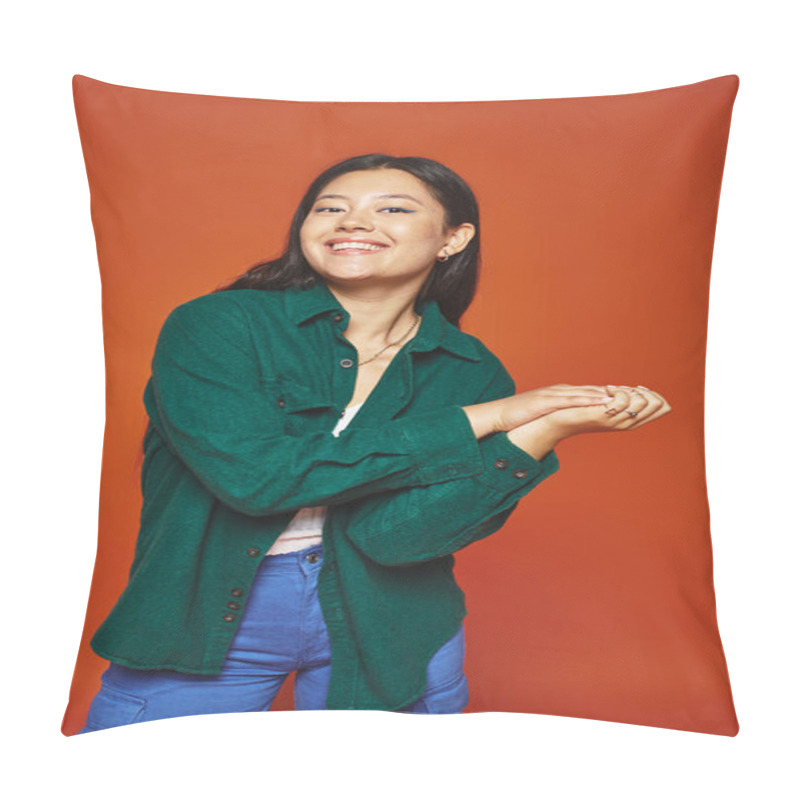 Personality  Radiant Young Asian Woman Posing In Vibrant Outfit And Looking At Camera On Orange Background Pillow Covers