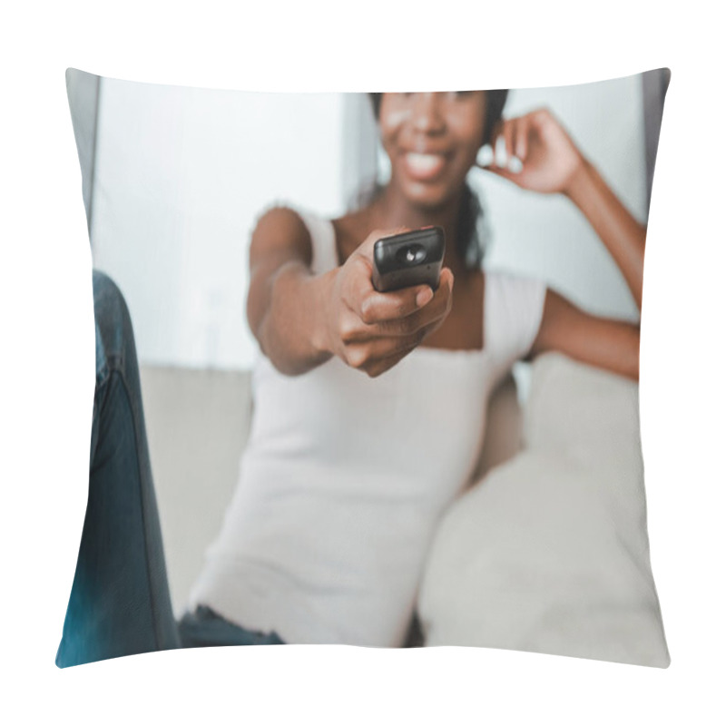 Personality  Selective Focus Of African American Woman With Outstretched Hand Showing Remote Controller And Smiling In Living Room Pillow Covers