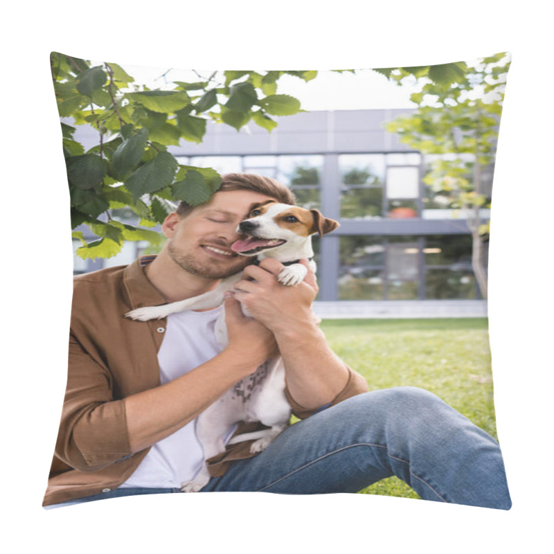 Personality  Young Man In Brown Shirt And Jeans Sitting On Lawn And Cuddling Jack Russell Terrier Dog Pillow Covers