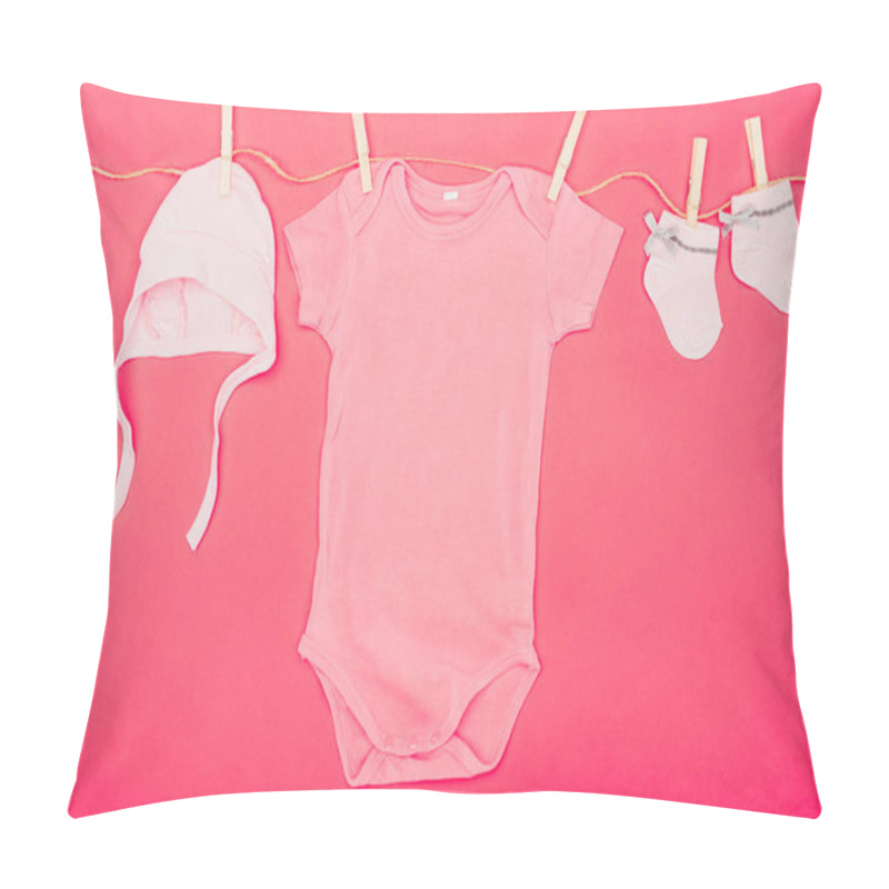 Personality  Top View Of Baby Clothes Drying On Rope Isolated On Red Pillow Covers