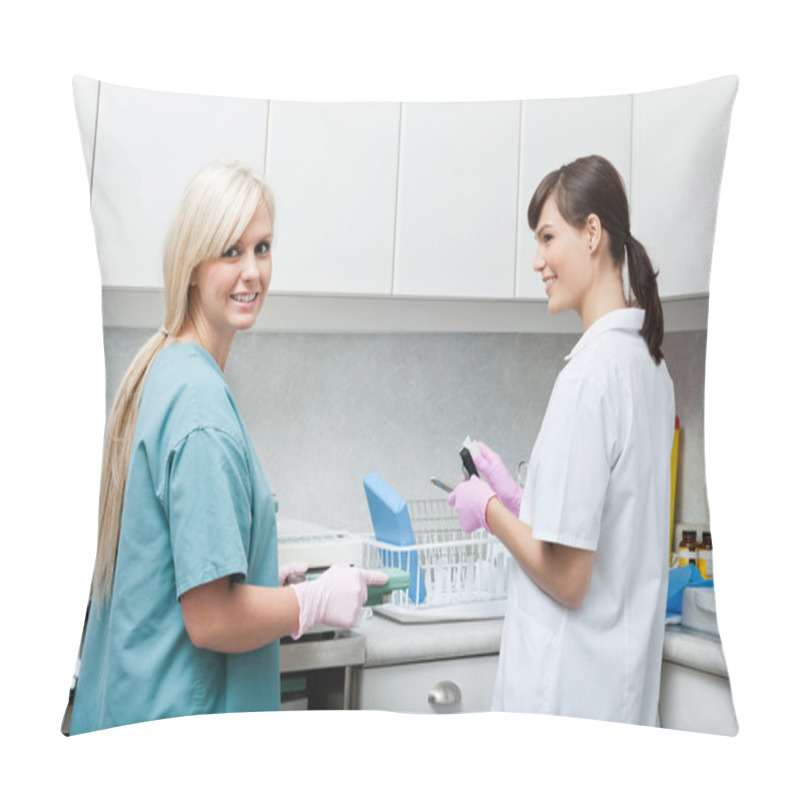 Personality  Smiling Dentist With Assistant Cleaning Medical Instruments At C Pillow Covers