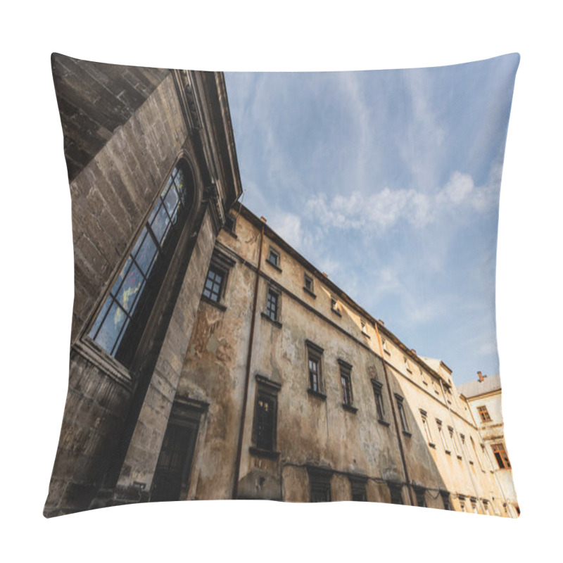 Personality  Low Angle View Of Old Stone Building Against Blue Sky In Lviv, Ukraine Pillow Covers