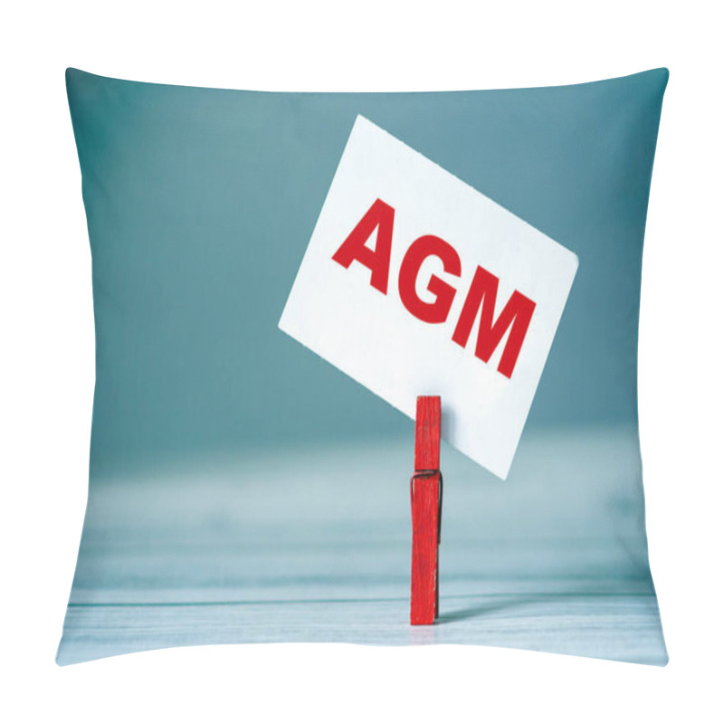 Personality  Reminder Sticky Note With Clothes Pin On Table. Sticky Note With Word AGM. Business Strategy Concept Pillow Covers