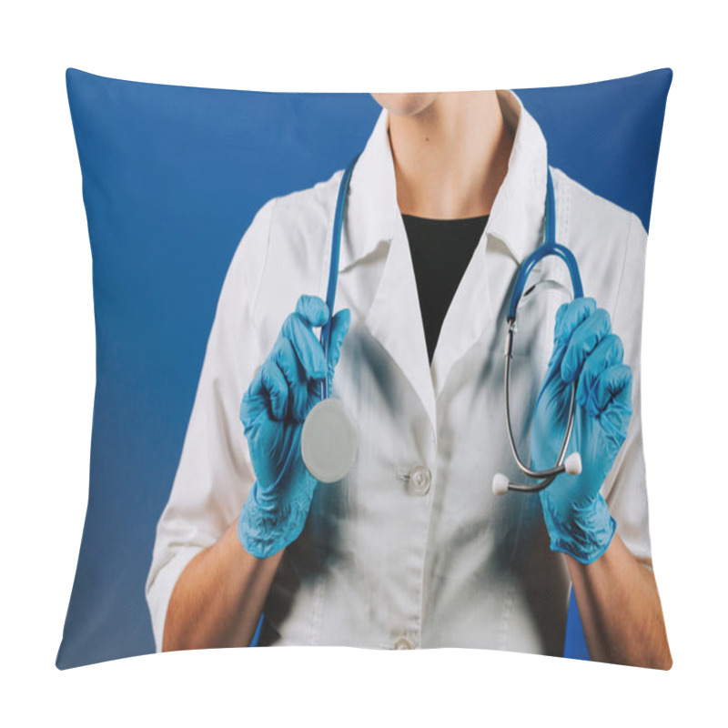 Personality  Portrait Of A Woman Pediatric Doctor In A White Coat With A Stethoscope Against A Blue Background Showcasing Her Dedication To Children's Health Pillow Covers