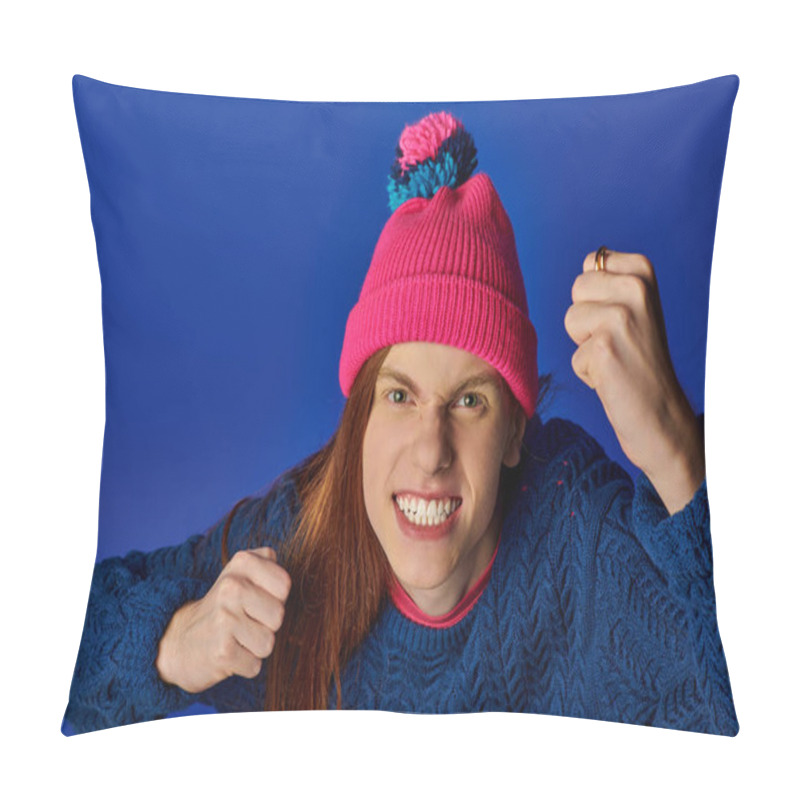 Personality  A Young Man Displays Intense Emotions With Clenched Fists While Wearing A Colorful Hat. Pillow Covers