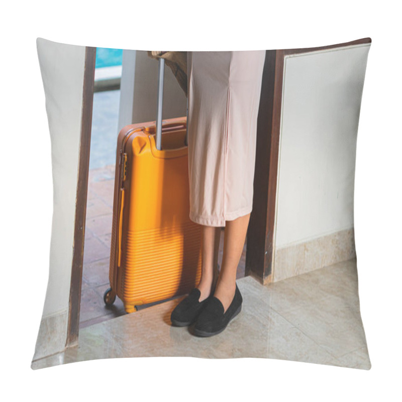 Personality  A Woman Walking By A Poolside With An Orange Suitcase, Wearing A Hat And Stylish Outfit. The Background Features Lush Greenery And A Wooden Structure, Creating A Tropical Vacation Vibe. Pillow Covers