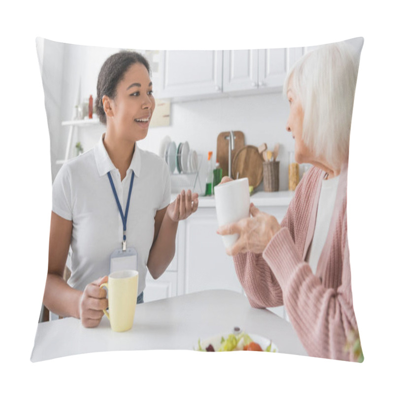 Personality  Happy Multiracial Social Worker Having Conversation With Senior Woman Over Cups Of Tea  Pillow Covers