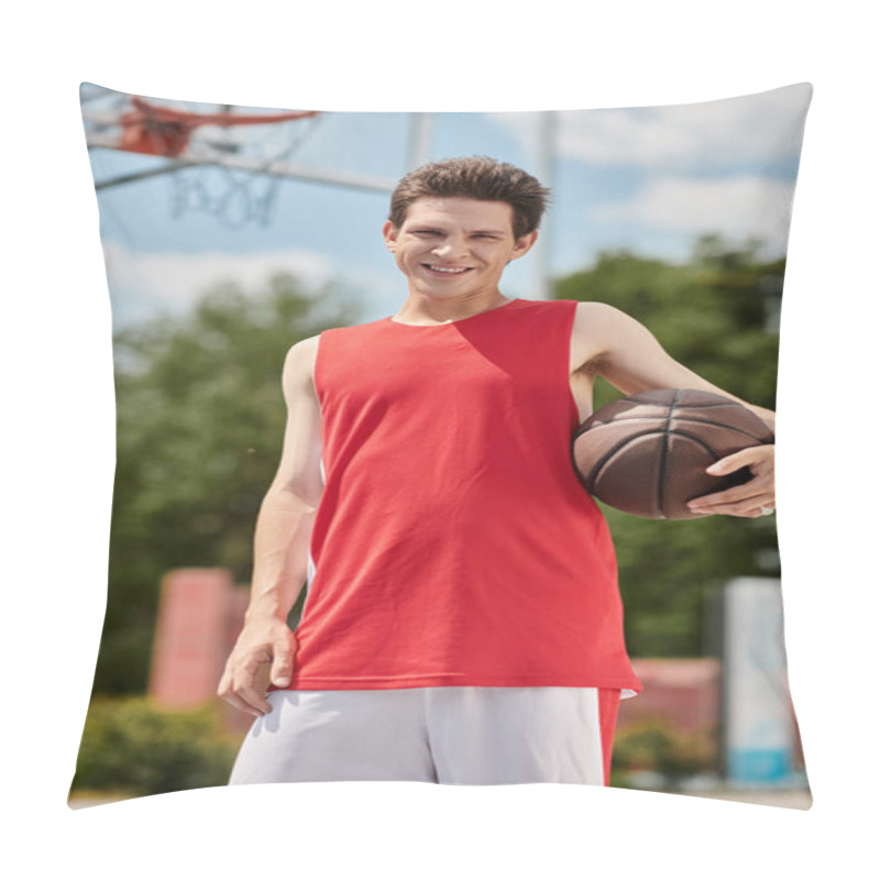 Personality  A Young Man In A Red Shirt Skillfully Holds A Basketball On A Sunny Summer Day Outdoors. Pillow Covers