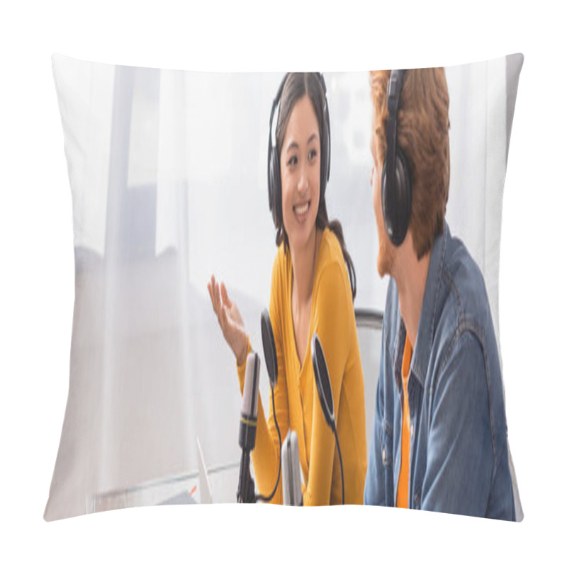 Personality  Horizontal Image Of Asian Announcer In Wireless Headphones Gesturing While Talking To Colleague In Studio Pillow Covers