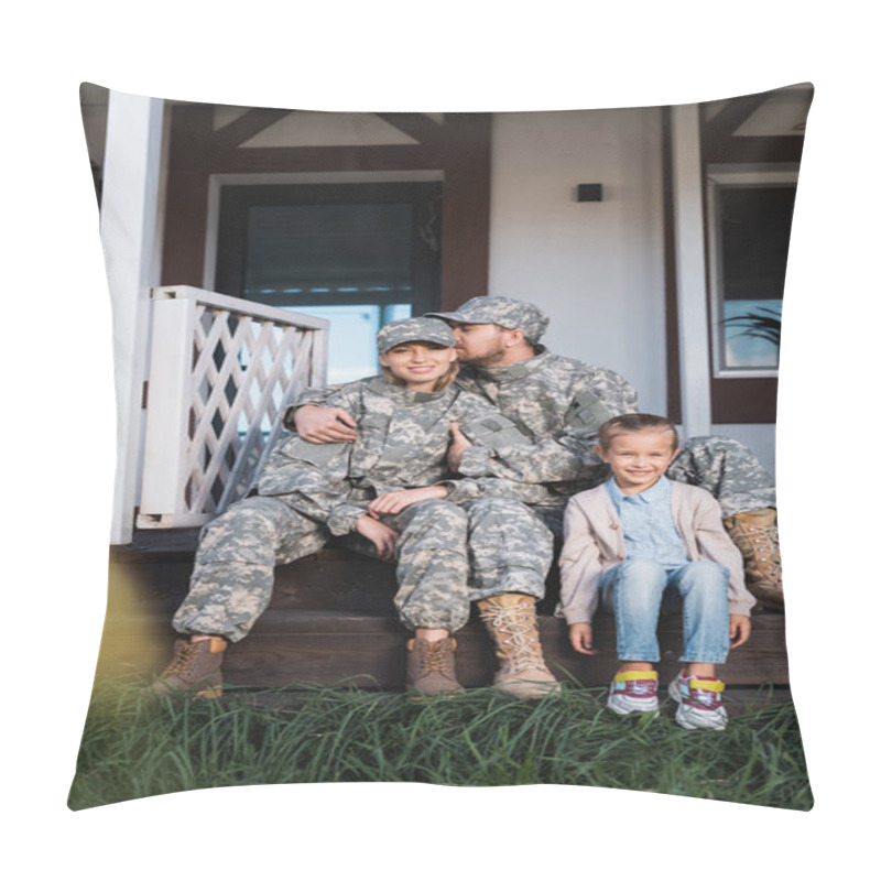 Personality  Man In Military Uniform Embracing And Smelling Wife Hair, Sitting Near Daughter On House Threshold On Blurred Foreground Pillow Covers