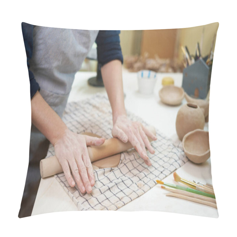 Personality  Hobbies Concept - A Woman Ceramist Rolls Clay With A Rolling Pin In A Pottery Workshop. Pillow Covers