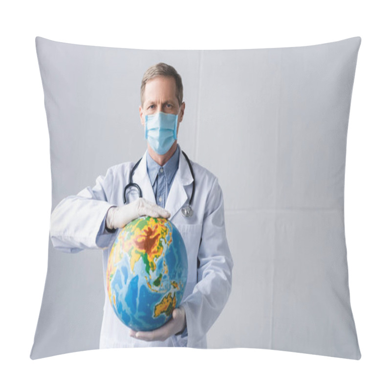 Personality  Mature Doctor In Latex Gloves And Medical Mask Holding Globe On Grey  Pillow Covers