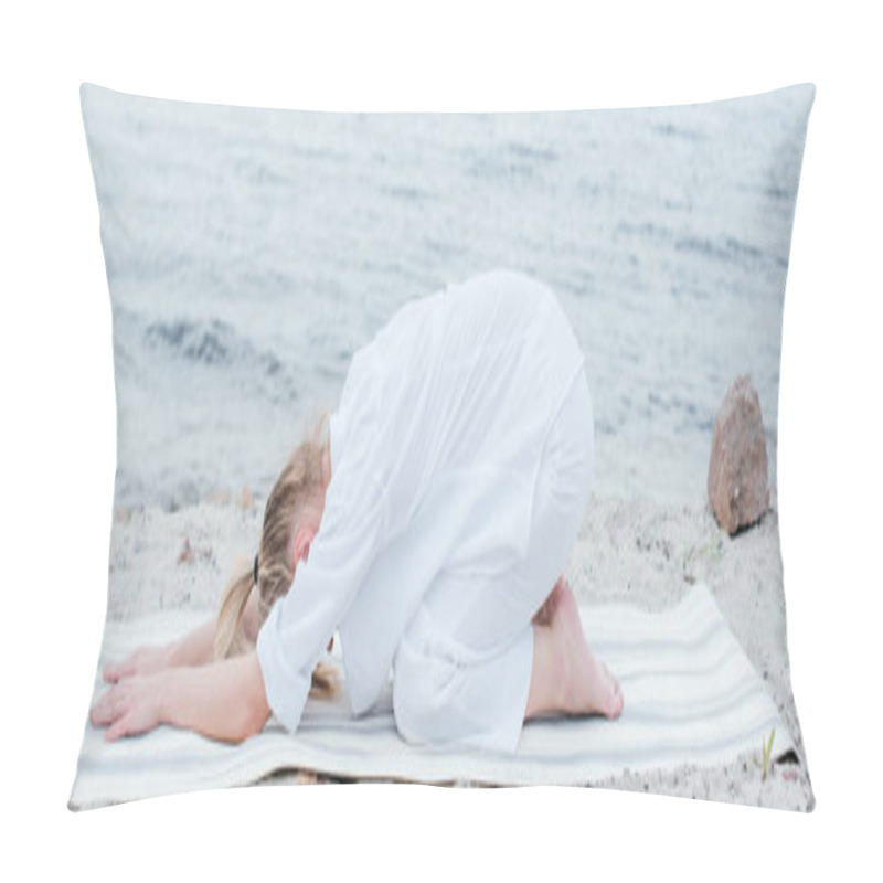 Personality  Panoramic Shot Of Blonde Young Woman Relaxing And Practicing Yoga On Yoga Mat Near Sea  Pillow Covers