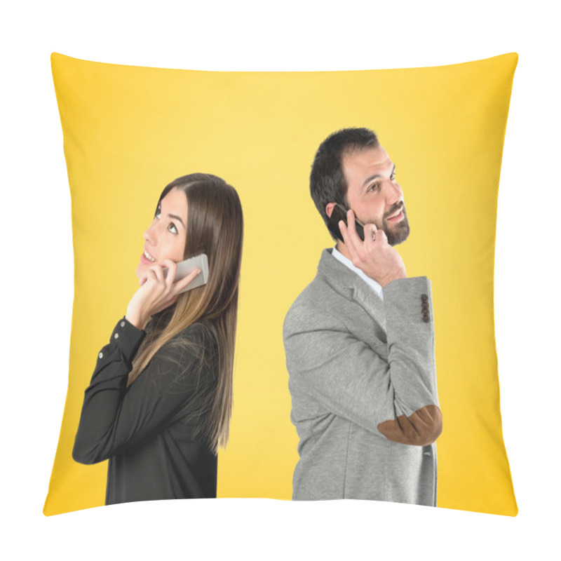 Personality  Couple Talking To Mobile Over Yellow Background.  Pillow Covers